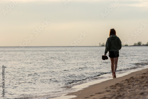 Woman walking the beach