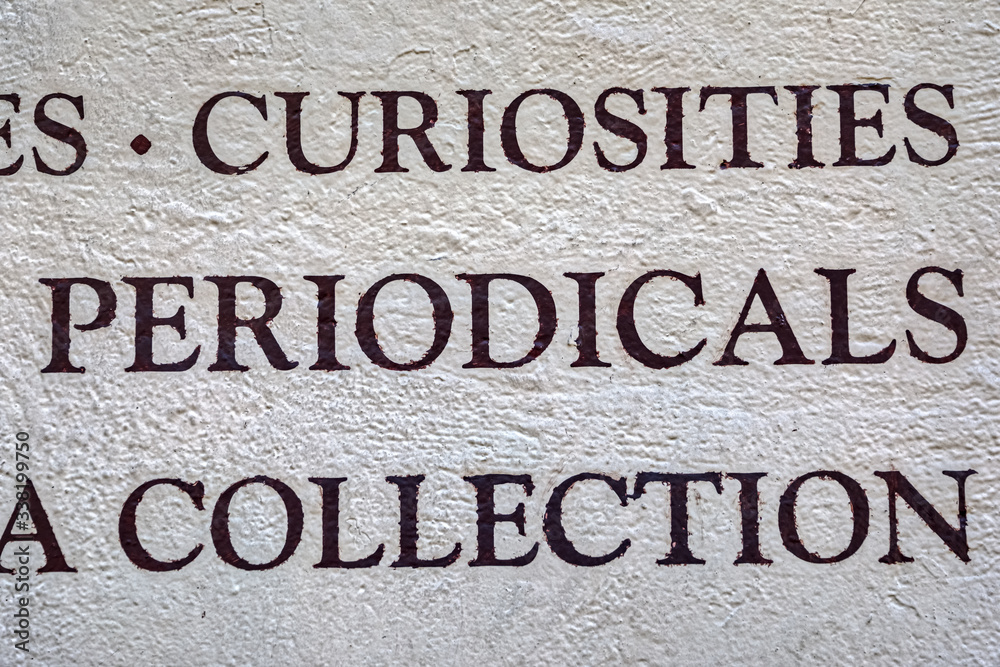 Common words for fashion sales: curiosities, periodicals and collection, painted on the wall Common words for fashion sales: curiosities, periodicals and collection, painted on the wall
