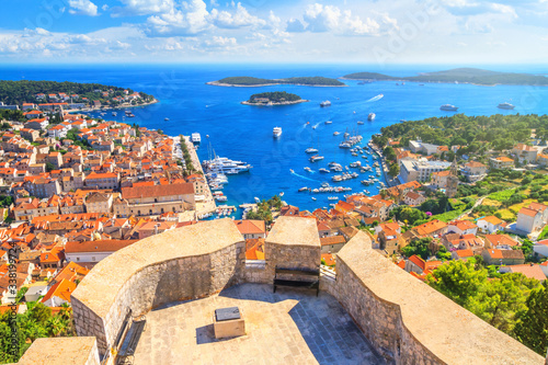 Coastal summer landscape - top view of the City Harbour and marina of the town of Hvar from the fortress, on the island of Hvar, the Adriatic coast of Croatia photo