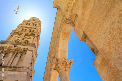 Cityscape - view of the bell tower of the Cathedral of Saint Domnius near the Palace of Diocletian in the Old Town of Split, the Adriatic coast of Croatia photo