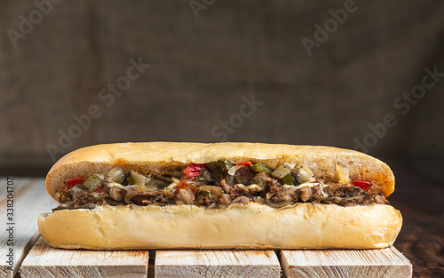 Philly cheese steak on wooden surface