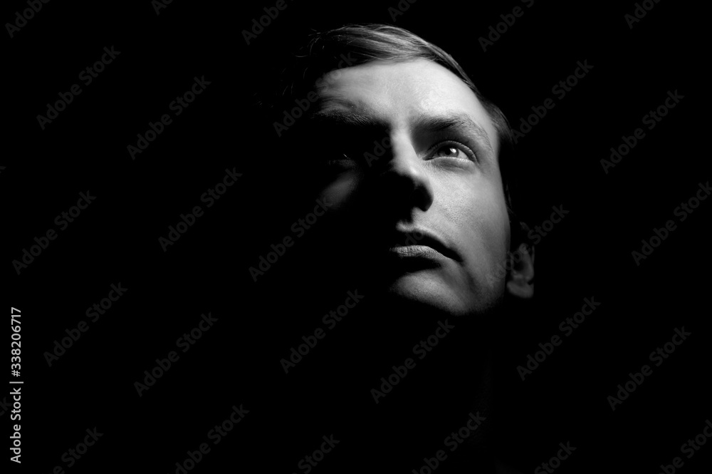 black and white dramatic portrait of a guy