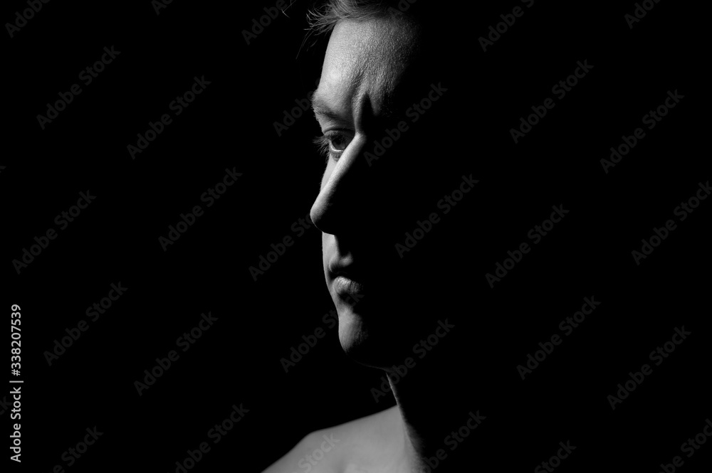 black and white dramatic portrait of a guy
