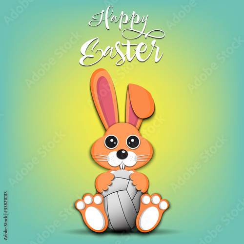 Rabbit with easter egg decorated in the form of a volleyball ball