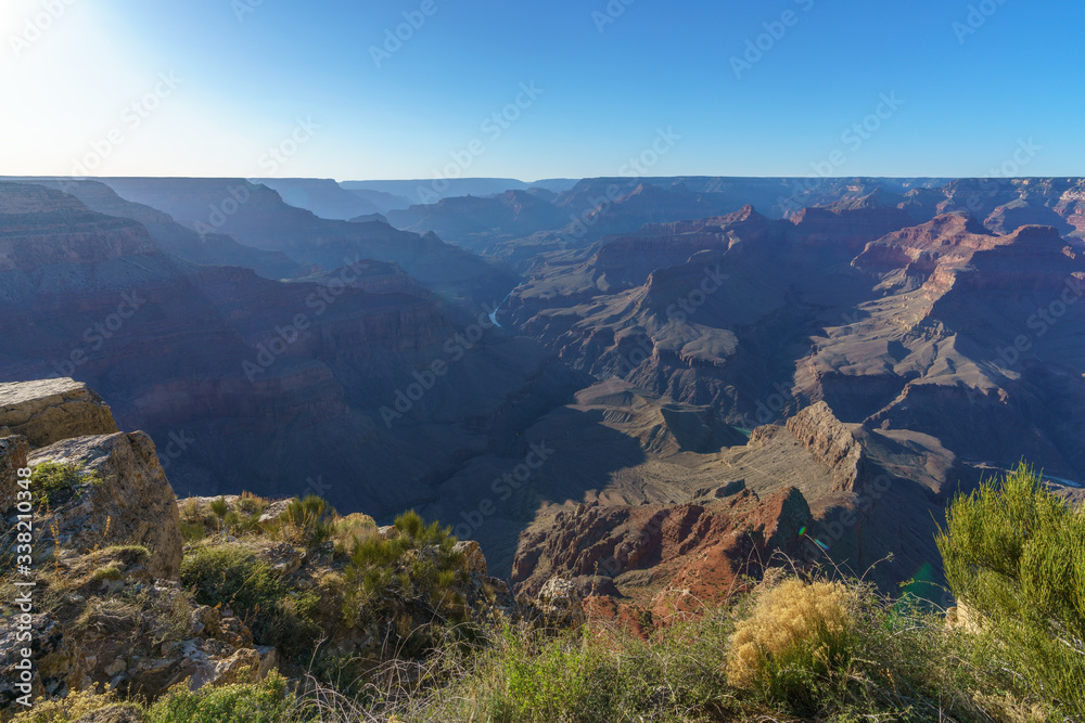 sunset at pima point on the rim trail at the south rim of grand canyon in arizona, usa