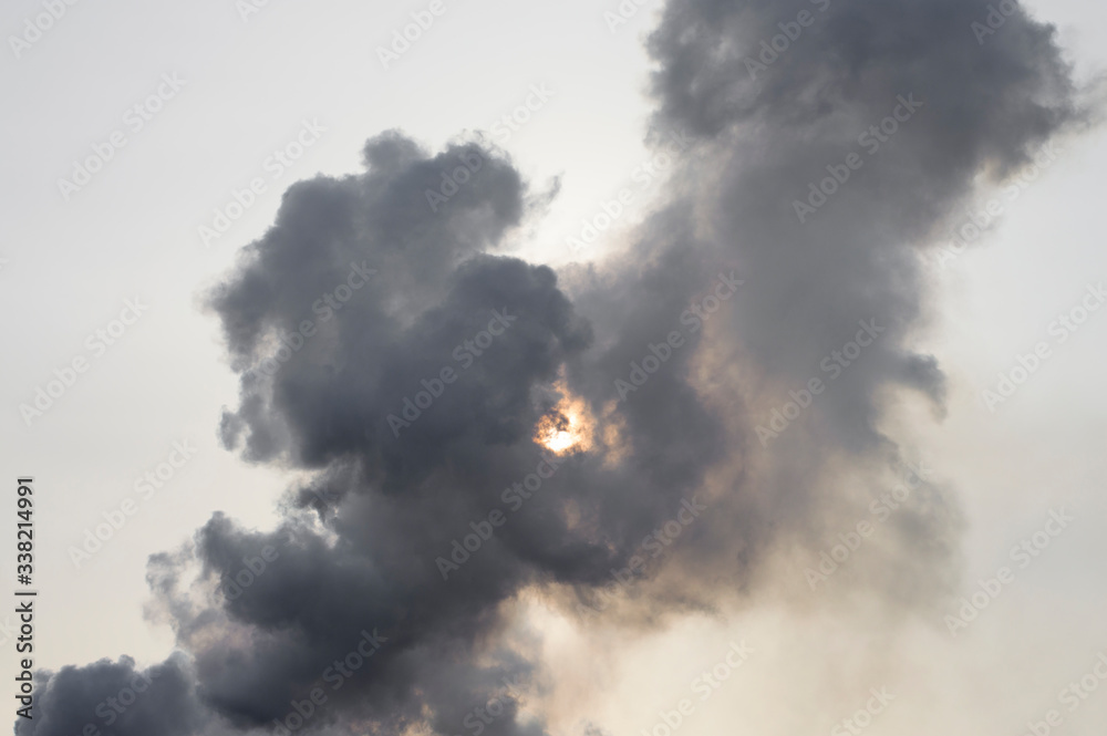 black thick smoke against the sky black thick smoke against the sky