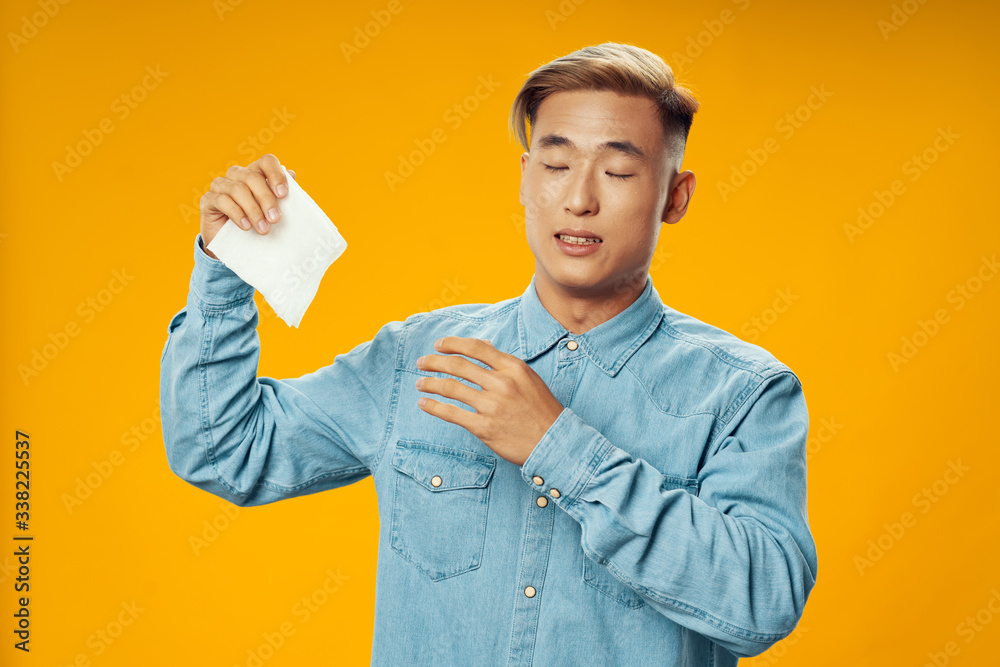 young man holding a blank card