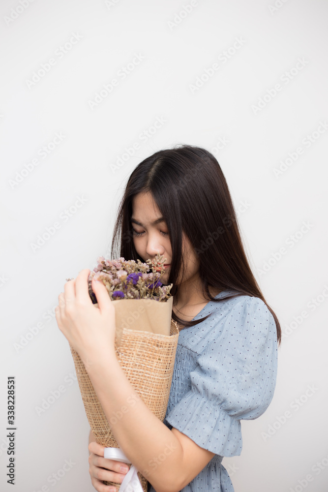 Beautiful sexy asian women hold bouquet dry flower Beautiful sexy asian women hold bouquet dry flower