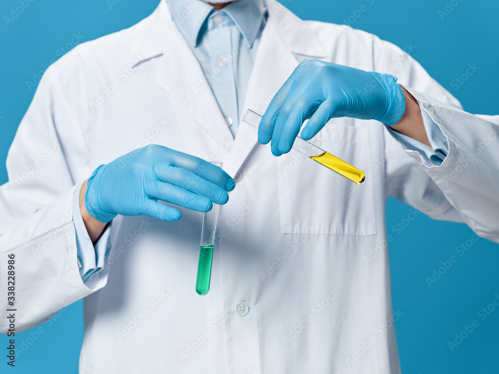 doctor holding a syringe doctor holding a syringe