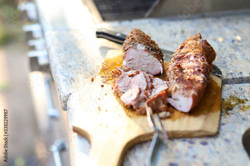 BBQ Pork Tenderloin on Wooden Cutting Board