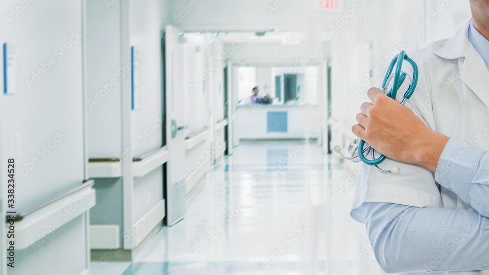 hand of medical doctor holding stethoscope in hospital hand of medical doctor holding stethoscope in hospital