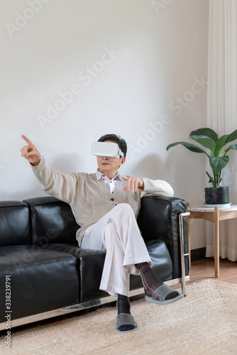 An Asian male wearing 3d glasses