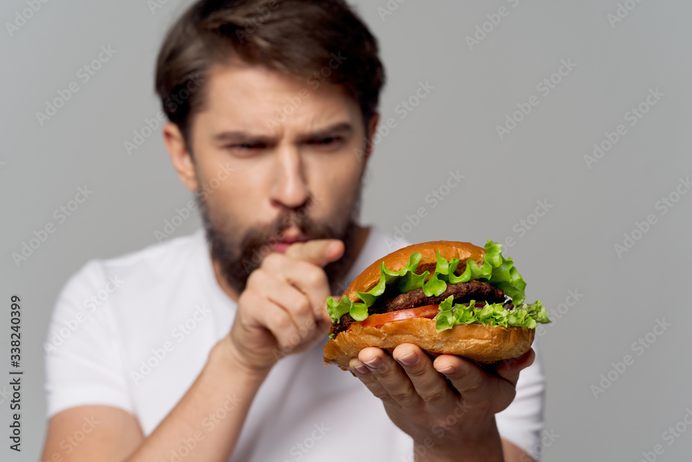 young man eating a sandwich