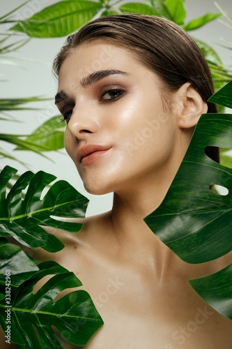 beautiful women naked shoulders green leaves Exotic tropics