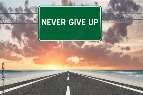 Never Give Up sign for success through persistence concept.