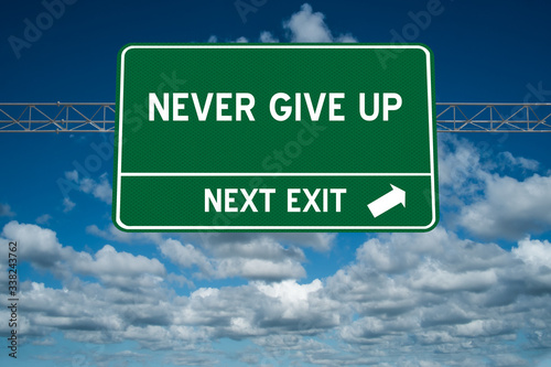 Never Give Up sign for success through persistence concept.
