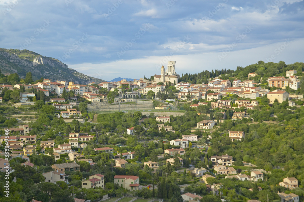 Town of La Turbie with Trophee des Alpes and church, France