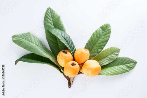 Fresh loquat fruit on white background