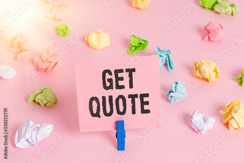 Text sign showing Get Quote. Business photo showcasing the most recent price to which a buyer and seller agreed Colored crumpled papers empty reminder pink floor background clothespin © Artur