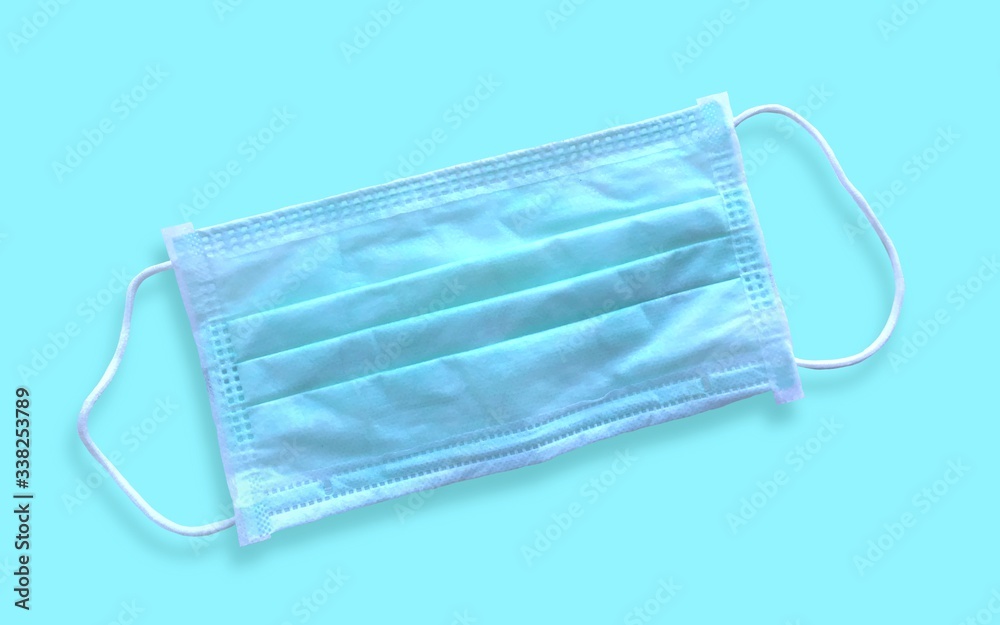 Medical mask for corona or covid-19 virus ,safety breathing masks for virus inflection,isolated on blue background, health protection concept,cover mouth and nose to prevent virus,pollution,pm2.5