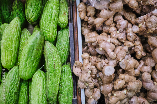 Photography Fresh ginger and cucumber for sale Inside Paddy's Markets, Sydney with lots of s
