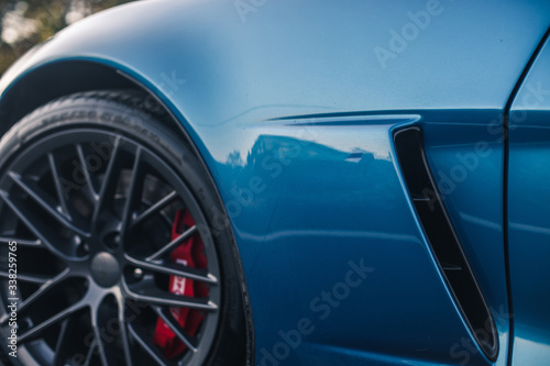 Blue brand sport model car front black wheel © azerbaijan-stockers