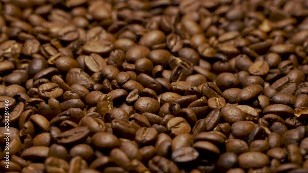 Coffee beans composition scrolls slowly around Coffee beans composition scrolls slowly around