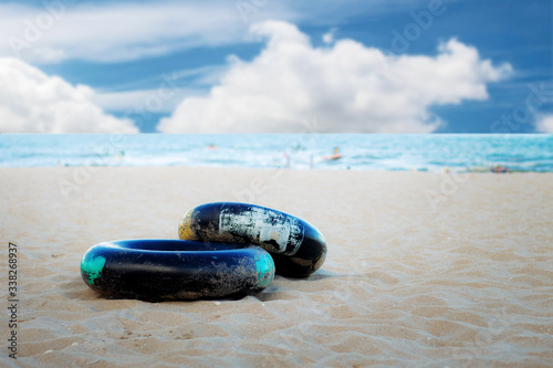 Life ring on sand beach.