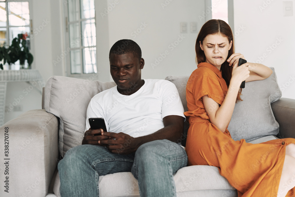 young couple watching tv young couple watching tv