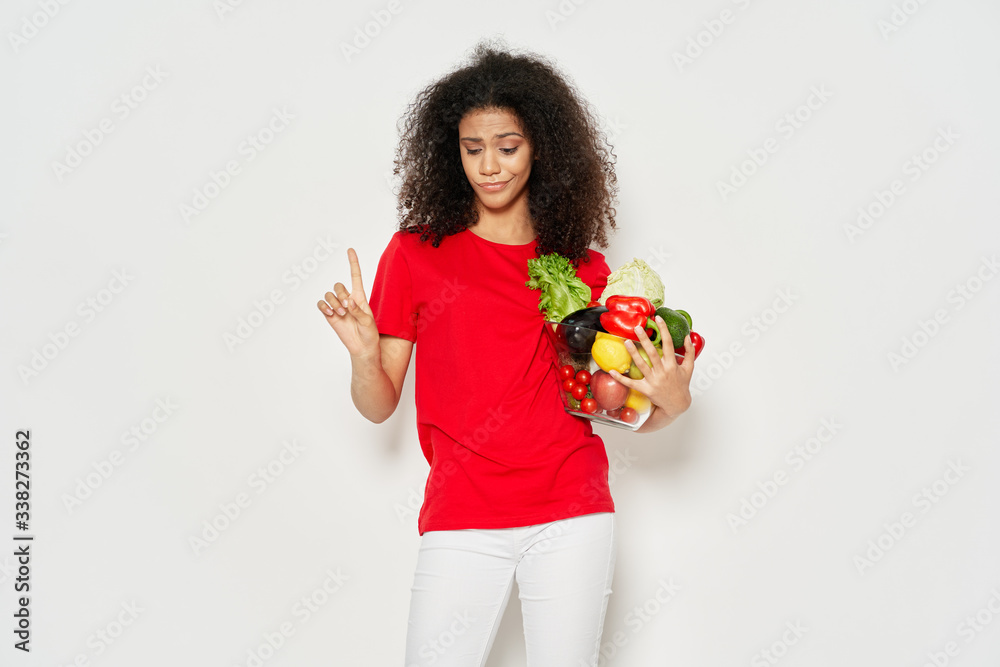 young woman holding a gift young woman holding a gift