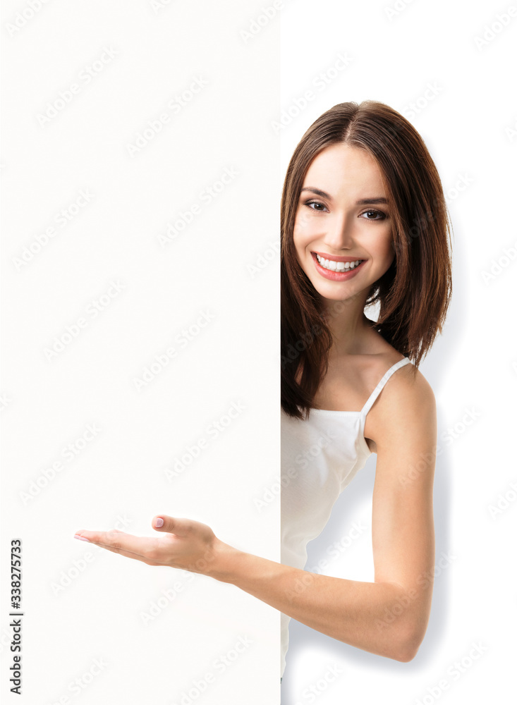 Portrait photo of brunette lovely woman showing blank signboard with copy space for some text or slogan, isolated over white background. Advertising, pr and marketing concept. Portrait photo of brunette lovely woman showing blank signboard with copy space for some text or slogan, isolated over white background. Advertising, pr and marketing concept.