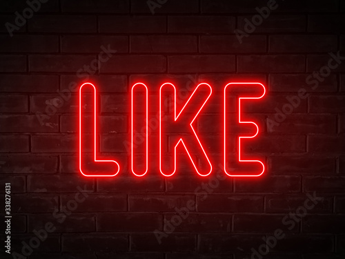 Like - red neon light word on brick wall background 
