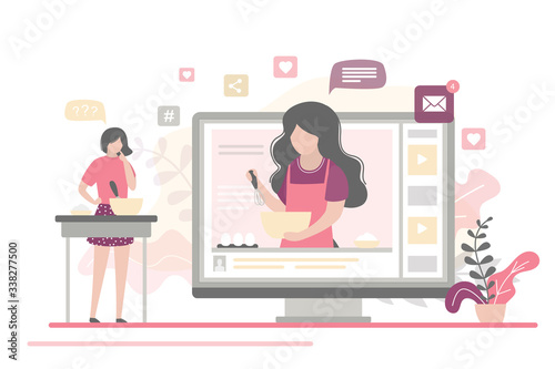Cooking video blog on monitor display. Food blogger tells how to cook a dish. Woman chef teaches cooking a new recipe.