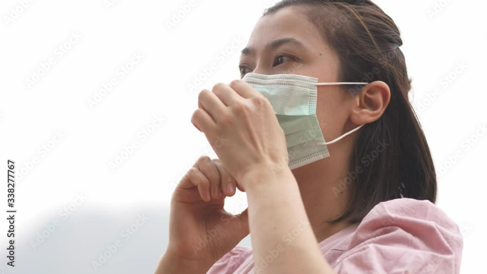 asian women wearing mask protect covid 19 corona virus pm 2.5 . healthcare concept. asian women wearing mask protect covid 19 corona virus pm 2.5 . healthcare concept.