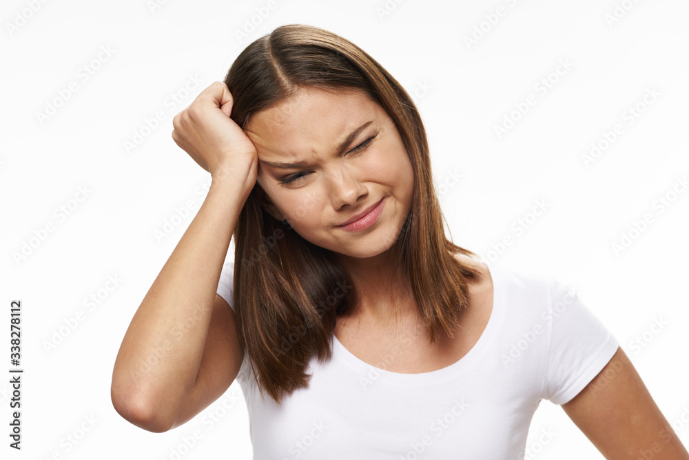 young woman with headache isolated on white young woman with headache isolated on white