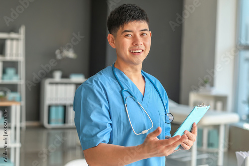 Male Asian doctor in clinic
