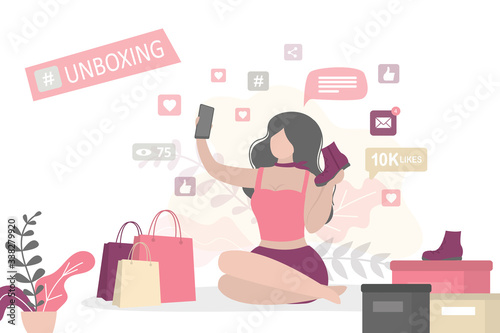 Female blogger making unboxing for footwear and recording video for her blog.