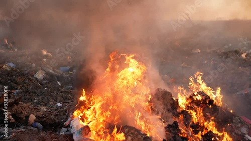 destruction of garbage. burning garbage. concern for the environment. environmental pollution. photo