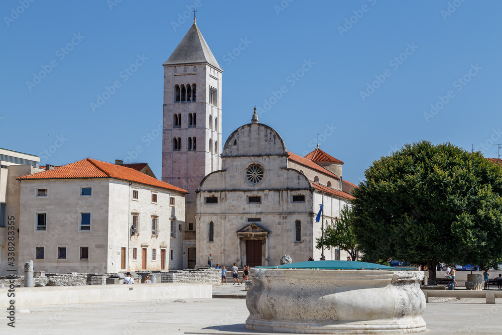 Fototapeta premium ZADAR / CROATIA - AUGUST 2015: Square in front of the old church in the historic centre of Zadar town, Croatia