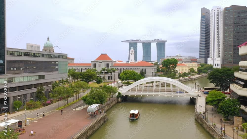 Reveal rising drone of Marina Bay Sands from Clarke Quay, Singapore. Reveal rising drone of Marina Bay Sands from Clarke Quay, Singapore.