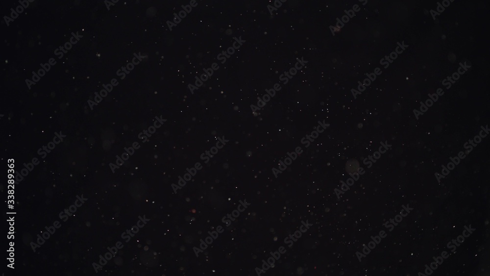 4k Natural Dust Organic Floating particles on black background. Dust in air atmosphere for your projects! Just drop it over your footage and use blending (screen) mode