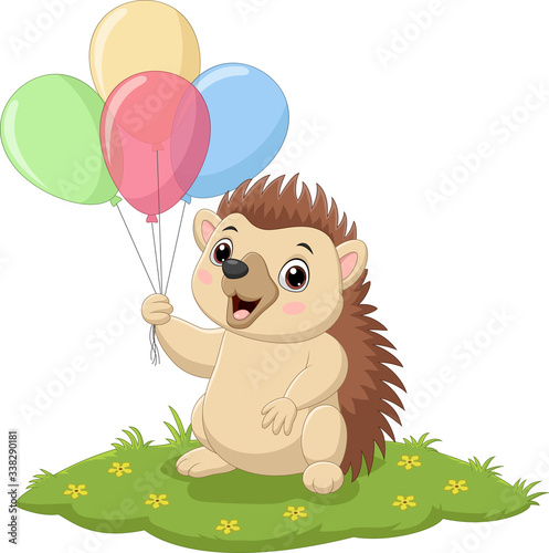 Cartoon hedgehog holding colorful balloons in the grass