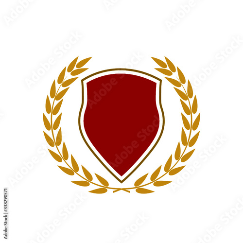 Golden shield with golden laurel wreath icon isolated on white background