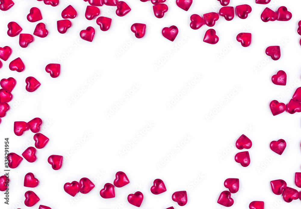 Frame made of pink decorative hearts isolated on a white background. St. Valentine`s day concept. Text space.