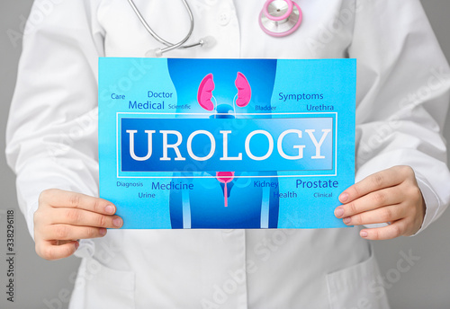 Doctor holding paper with w...