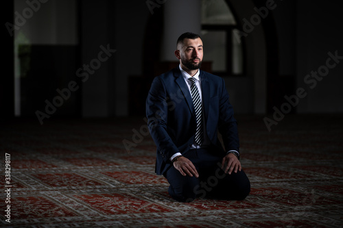 Businessman Muslim Praying in Mosque