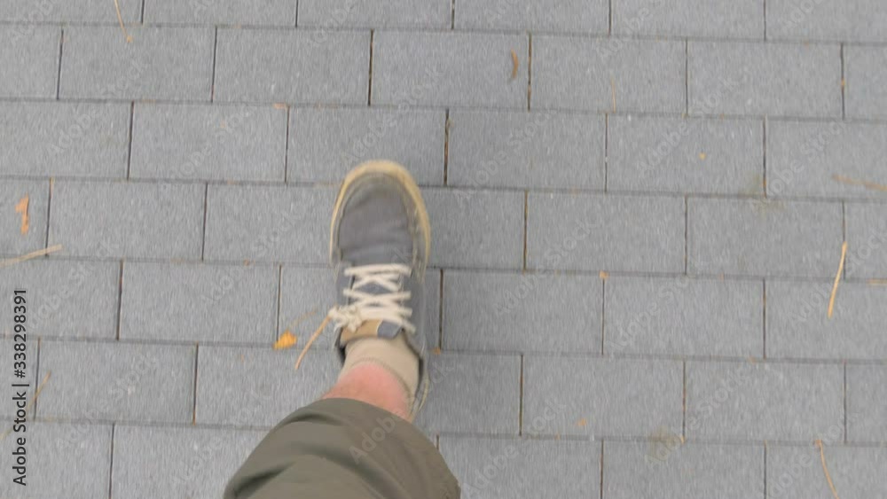 26895_A_man_in_gray_shoes_walking_on_a_concrete_road_in_Tokyo_Japan.mov 26895_A_man_in_gray_shoes_walking_on_a_concrete_road_in_Tokyo_Japan.mov
