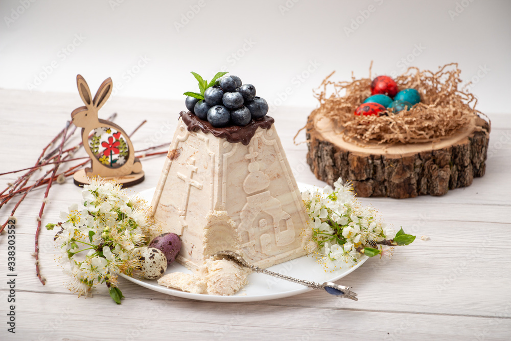 Marble Easter cake with engraving on a white background Marble Easter cake with engraving on a white background