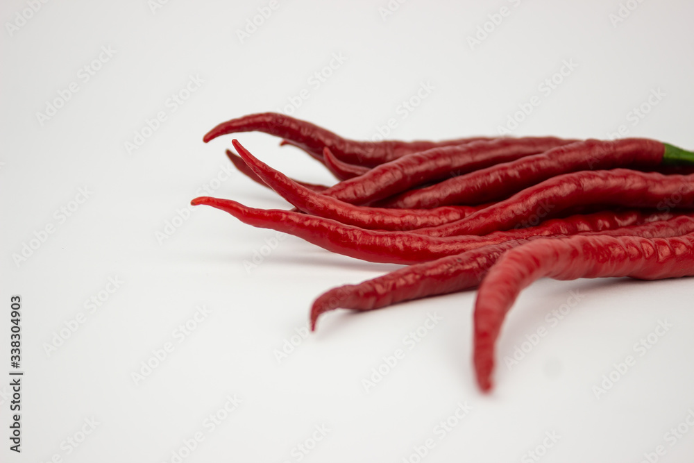 Naklejka premium Red chilli pepper on whhite background