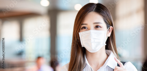 Asian woman with facial mask photo